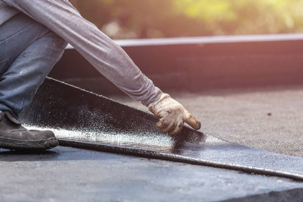 Professional Emergency Waterproofing technician working in Erie, PA